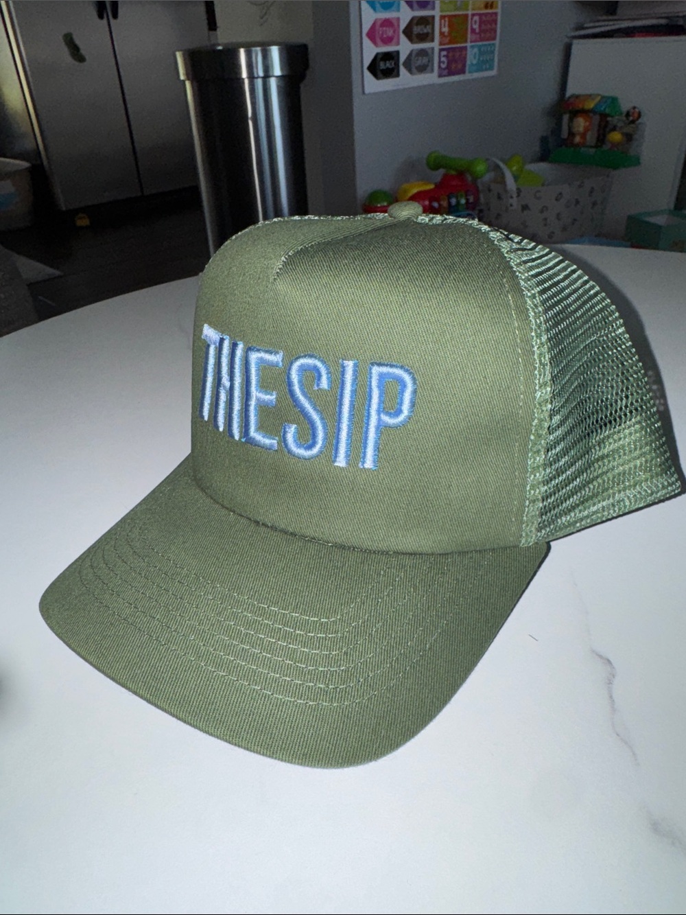 Green Trucker Hat with 'THESIP' Embroidered Logo